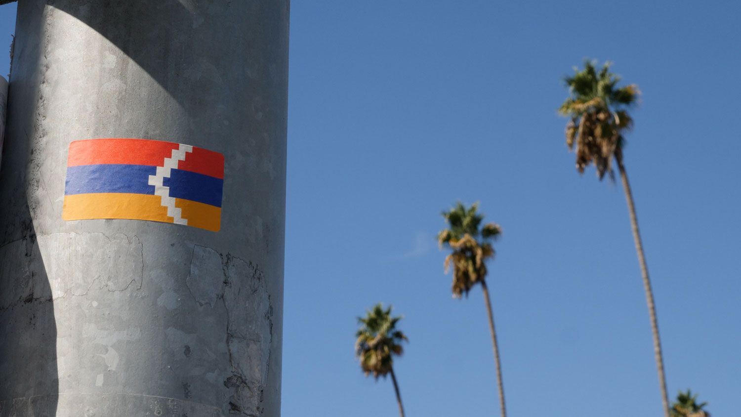 Armenian flag on a post in California.